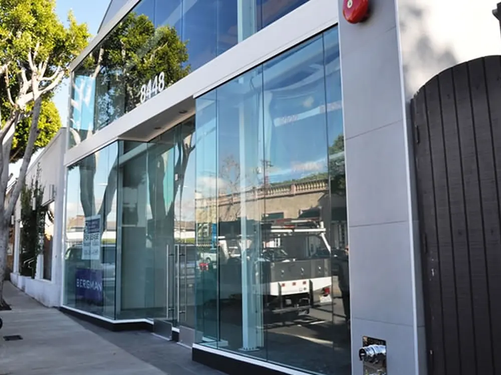 Street view of a glass storefront where the film is invisible from the sidewalk.